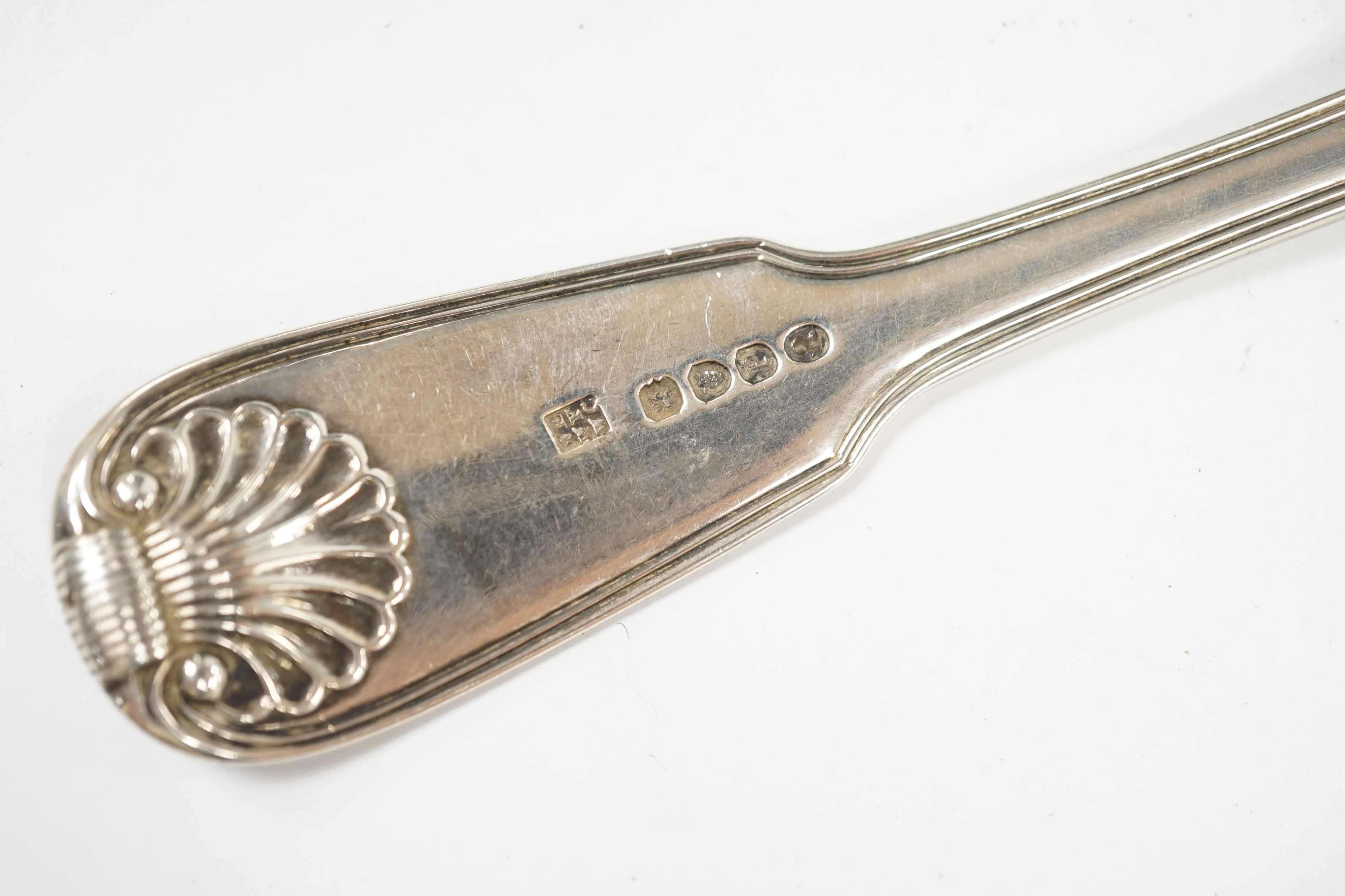 A George III silver fiddle, thread and shell pattern fish slice, Eley, Fearn & Chawner, London, 1810, 31cm, 6oz. Condition - fair